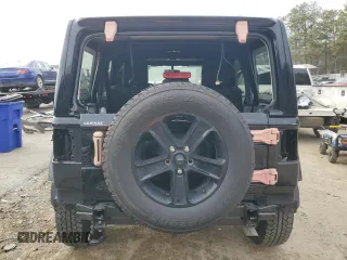 2023 Jeep Wrangler Sahara with VIN 1C4HJXEN2PW575544, listed as a Copart auction lot 89291005 with 27,198 mi miles and Salvage Title. Bid and sale history available at carsss.com. Image 6.