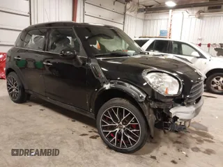 2012 MINI Countryman with VIN WMWZB3C53CWM05133, listed as a IAAI auction lot 41493309 with 114,412 mi miles and . Bid and sale history available at DreamBid. Image 1.