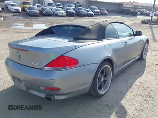 2007 BMW 6 Series 650i with VIN WBAEK13547CN82672, listed as a IAAI auction lot 40927402 with 183,197 mi miles. Bid and sale history available at carsss.com. Image 4.