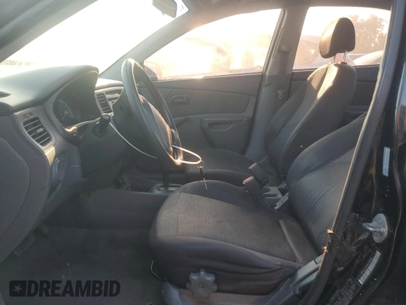 2009 Kia Rio LX with VIN KNADE223296539006, listed as a Copart auction lot 69229394 with 227,766 mi miles and Salvage Title. Bid and sale history available at DreamBid. Image 7.