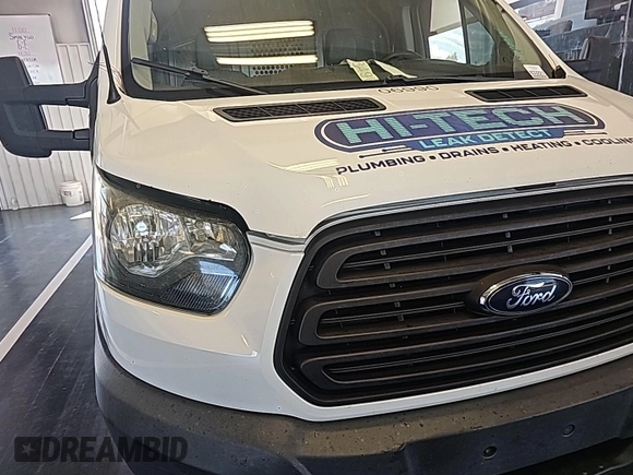 2016 Ford Transit Cargo with VIN 1FTYE1ZM0GKB06690, listed as a IAAI auction lot 42677893 with 295,974 mi miles and . Bid and sale history available at DreamBid. Image 19.