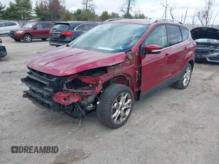 2016 Ford Escape Titanium with VIN 1FMCU9JX2GUA89716, listed as a IAAI auction lot 41899786 with 85,474 mi miles and . Bid and sale history available at DreamBid. Image 20.
