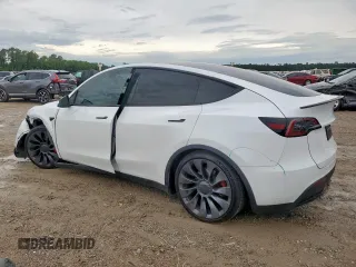 2024 Tesla Model Y Performance z VIN 7SAYGDEF0RA266605, wystawiony jako Copart lot #57820905 z przebiegiem Nie podano mil oraz Szkoda całkowita • Salvage title. Historia ofert i sprzedaży dostępna na DreamBid. Obrazek 2.