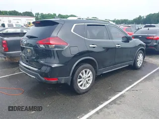 2019 Nissan Rogue SV with VIN JN8AT2MT1KW261931, listed as a IAAI auction lot 42274227 with 141,518 mi miles and . Bid and sale history available at DreamBid. Image 4.