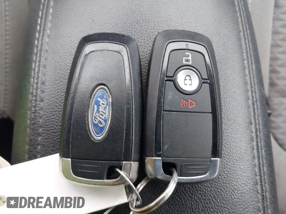 2020 Ford Escape SE z VIN 1FMCU9G66LUC32126, wystawiony jako IAAI lot #42313650 z przebiegiem 104 550 mil mil oraz . Historia ofert i sprzedaży dostępna na DreamBid. Obrazek 11.