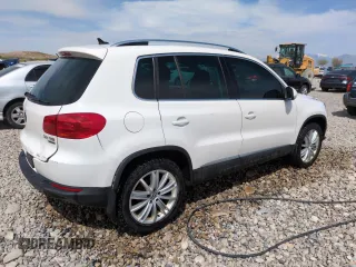 2013 Volkswagen Tiguan SEL with VIN WVGBV3AX6DW610541, listed as a Copart auction lot 49435125 with 73,952 mi miles and Salvage Title. Bid and sale history available at DreamBid. Image 3.