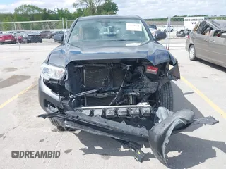 2019 Toyota Tacoma SR with VIN 5TFSX5EN4KX070181, listed as a IAAI auction lot 42318751 with 68,334 mi miles and . Bid and sale history available at DreamBid. Image 12.