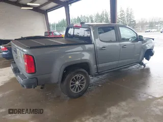 2018 Chevrolet Colorado 4WD ZR2 with VIN 1GCGTEEN9J1325135, listed as a IAAI auction lot 41869769 with 77,327 mi miles. Bid and sale history available at carsss.com. Image 4.