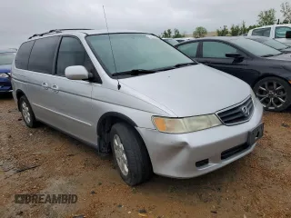 2004 Honda Odyssey EX-L with VIN 5FNRL18984B025100, listed as a Copart auction lot 53227364 with 331,293 mi miles and Salvage Title. Bid and sale history available at DreamBid. Image 4.