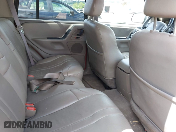 2004 Jeep Grand Cherokee Laredo z VIN 1J8GW48S24C400424, wystawiony jako IAAI lot #42215397 z przebiegiem 122 246 mil mil oraz . Historia ofert i sprzedaży dostępna na DreamBid. Obrazek 8.