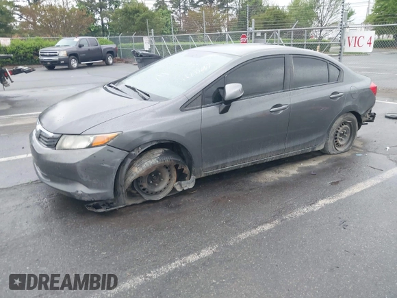 2012 Honda Civic LX with VIN 2HGFB2F58CH593658, listed as a IAAI auction lot 41965400 with 172,340 mi miles and . Bid and sale history available at DreamBid. Image 2.