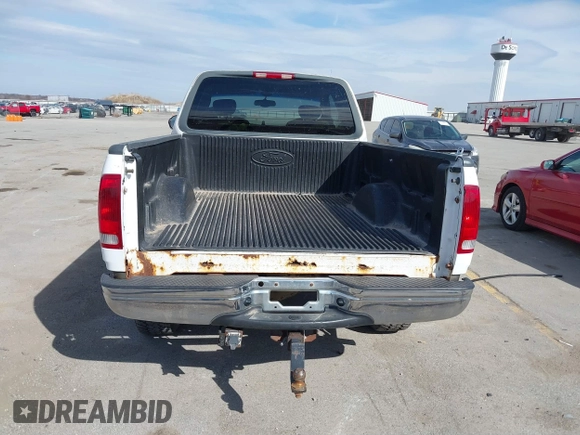 2001 Ford F-150 XL with VIN 1FTRX18LX1KA49557, listed as a IAAI auction lot 41875941 with 192,202 mi miles. Bid and sale history available at carsss.com. Image 12.
