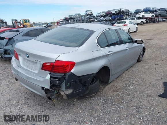 2015 BMW 5 Series 535i xDrive with VIN WBA5B3C54FD544802, listed as a IAAI auction lot 41283822 with 93,828 mi miles. Bid and sale history available at carsss.com. Image 4.