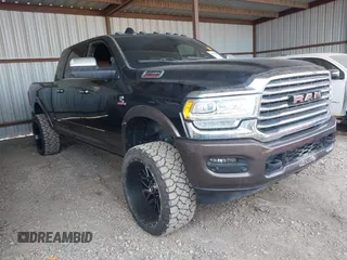 2019 Ram 2500 Longhorn z VIN 3C6UR5PL3KG677053, wystawiony jako IAAI lot #40991447 z przebiegiem 109 907 mil mil oraz . Historia ofert i sprzedaży dostępna na DreamBid. Obrazek 1.