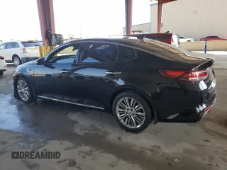 2016 Kia Optima SXL Turbo with VIN 5XXGV4L24GG111843, listed as a Copart auction lot 43738725 with 76,288 mi miles and Clean Title. Bid and sale history available at carsss.com. Image 2.