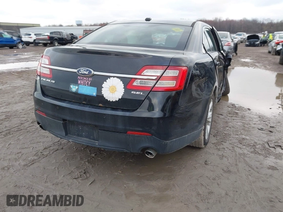 2013 Ford Taurus SEL with VIN 1FAHP2E87DG180296, listed as a IAAI auction lot 42016506 with 137,352 mi miles. Bid and sale history available at carsss.com. Image 4.