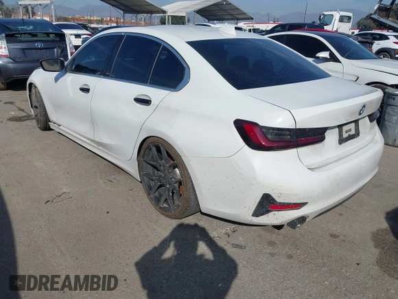 2019 BMW 3 Series 330i with VIN WBA5R1C59KAJ99746, listed as a IAAI auction lot 41566192 with 55,090 mi miles and . Bid and sale history available at DreamBid. Image 3.