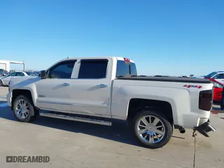 2015 Chevrolet Silverado 1500 High Country with VIN 3GCUKTEC9FG167929, listed as a IAAI auction lot 41668399 with 220,194 mi miles. Bid and sale history available at carsss.com. Image 14.