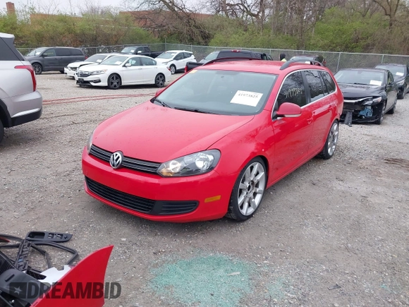 2012 Volkswagen Jetta SportWagen TDI w/Sunroof with VIN 3VWPL7AJ8CM671484, listed as a IAAI auction lot 41973825 with 155,220 mi miles. Bid and sale history available at carsss.com. Image 2.