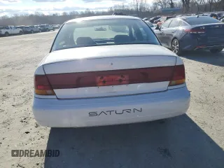 1996 Saturn SL with VIN 1G8ZK5279TZ162812, listed as a Copart auction lot 87079874 with 143,461 mi miles and Salvage title. Bid and sale history available at DreamBid. Image 6.