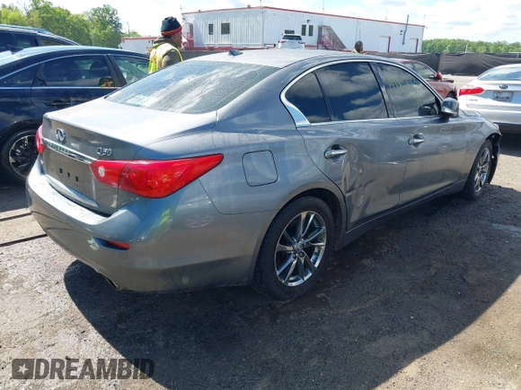 2015 Infiniti Q50 Premium with VIN JN1BV7AR7FM409374, listed as a IAAI auction lot 42202230 with 79,453 mi miles and . Bid and sale history available at DreamBid. Image 4.