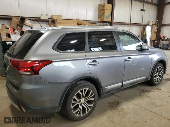 2016 Mitsubishi Outlander ES z VIN JA4AZ2A34GZ604519, wystawiony jako Copart lot #54229255 z przebiegiem 153 703 mil mil oraz Szkoda całkowita • Salvage title. Historia ofert i sprzedaży dostępna na DreamBid. Obrazek 3.