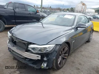2015 BMW 4 Series 428i with VIN WBA3V7C54FP772531, listed as a IAAI auction lot 41487899 with 90,893 mi miles. Bid and sale history available at carsss.com. Image 18.