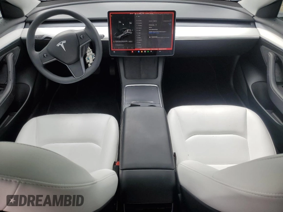 2023 Tesla Model 3 with VIN 5YJ3E1EA3PF672023, listed as a Copart auction lot 57571645 with 18,115 mi miles and Salvage title. Bid and sale history available at DreamBid. Image 8.
