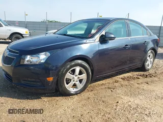 2014 Chevrolet Cruze 1LT z VIN 1G1PC5SB5E7245983, wystawiony jako IAAI lot #42552033 z przebiegiem 168 310 mil mil oraz . Historia ofert i sprzedaży dostępna na DreamBid. Obrazek 2.