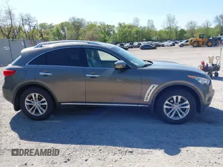 2011 Infiniti FX35 with VIN JN8AS1MW0BM141914, listed as a IAAI auction lot 42151160 with 211,708 mi miles. Bid and sale history available at carsss.com. Image 13.