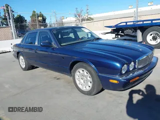 2000 Jaguar XJ with VIN SAJDA14C4YLF16529, listed as a IAAI auction lot 41387819 with 90,143 mi miles and . Bid and sale history available at DreamBid. Image 1.