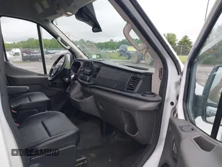 2022 Ford Transit Cargo with VIN 1FTBR3U85NKA64272, listed as a IAAI auction lot 42427708 with 62,043 mi miles and . Bid and sale history available at DreamBid. Image 5.