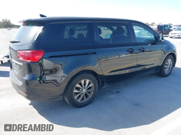 2020 Kia Sedona EX with VIN KNDMB5C18L6581794, listed as a IAAI auction lot 41767614 with 131,009 mi miles. Bid and sale history available at carsss.com. Image 4.