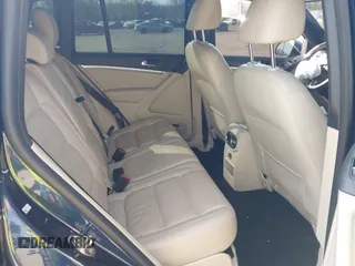 2014 Volkswagen Tiguan S z VIN WVGBV3AX7EW545538, wystawiony jako IAAI lot #42083281 z przebiegiem 129 227 mil mil oraz . Historia ofert i sprzedaży dostępna na DreamBid. Obrazek 8.