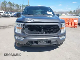 2021 Ford F-150 XL with VIN 1FTEW1EP4MFA83239, listed as a IAAI auction lot 41859403 with 114,053 mi miles and . Bid and sale history available at DreamBid. Image 12.