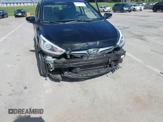 2014 Hyundai Accent SE z VIN KMHCU5AE6EU165345, wystawiony jako IAAI lot #42308781 z przebiegiem 98 216 mil mil oraz . Historia ofert i sprzedaży dostępna na DreamBid. Obrazek 6.