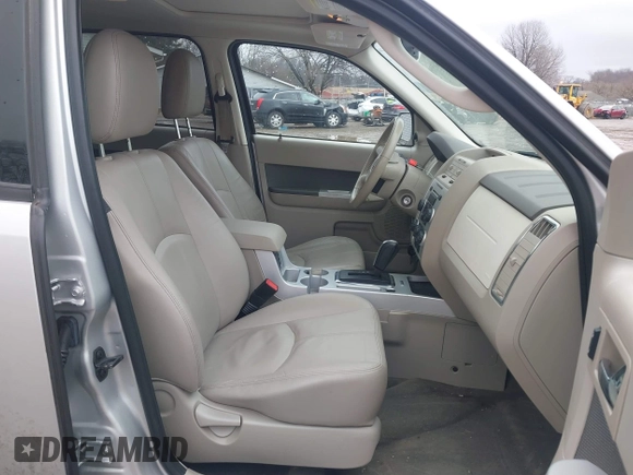 2009 Mercury Mariner Premier with VIN 4M2CU97719KJ15260, listed as a IAAI auction lot 41500367 with 104,063 mi miles. Bid and sale history available at carsss.com. Image 5.