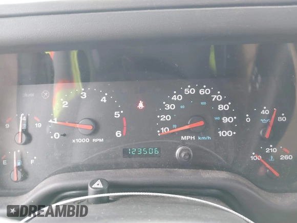 2002 Jeep Wrangler Sahara with VIN 1J4FA59S02P760345, listed as a IAAI auction lot 41634902 with 123,506 mi miles. Bid and sale history available at carsss.com. Image 7.