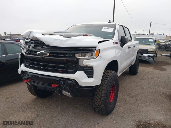 2024 Chevrolet Silverado 1500 LT Trail Boss with VIN 3GCUDFE81RG231196, listed as a IAAI auction lot 41242013 with 14,747 mi miles. Bid and sale history available at carsss.com. Image 2.