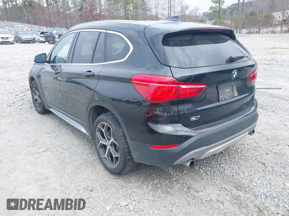 2017 BMW X1 sDrive28i with VIN WBXHU7C36HP924874, listed as a IAAI auction lot 41368396 with 113,443 mi miles. Bid and sale history available at carsss.com. Image 3.