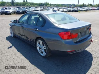 2012 BMW 3 Series 335i with VIN WBA3A9C5XCF077642, listed as a IAAI auction lot 42385611 with 119,251 mi miles and . Bid and sale history available at DreamBid. Image 3.