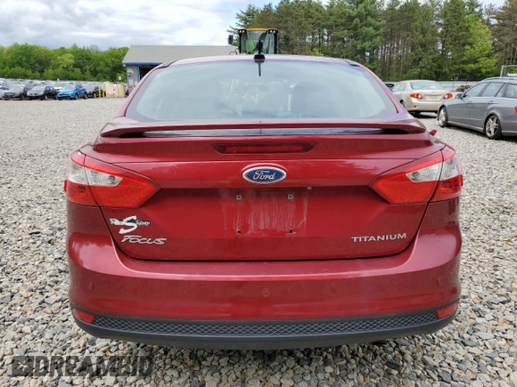 2014 Ford Focus Titanium with VIN 1FADP3J20EL352909, listed as a Copart auction lot 58501085 with 174,388 mi miles and Salvage title. Bid and sale history available at DreamBid. Image 6.