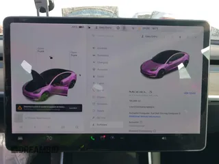 2020 Tesla Model 3 Standard Range Plus z VIN 5YJ3E1EA1LF660611, wystawiony jako IAAI lot #41856495 z przebiegiem 141 086 mil mil oraz . Historia ofert i sprzedaży dostępna na DreamBid. Obrazek 7.