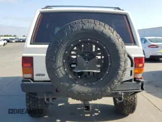 1996 Jeep Cherokee SE z VIN 1J4FJ28S7TL270218, wystawiony jako Copart lot #55302885 z przebiegiem 239 209 mil mil oraz Szkoda całkowita • Salvage title. Historia ofert i sprzedaży dostępna na DreamBid. Obrazek 6.