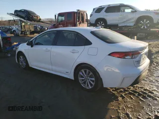 2023 Toyota Corolla Hybrid LE with VIN JTDBDMHE1P3004992, listed as a Copart auction lot 85273064 with 29,960 mi miles and Salvage Title. Bid and sale history available at carsss.com. Image 2.
