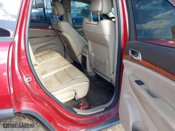 2011 Jeep Grand Cherokee Overland with VIN 1J4RR6GT9BC652336, listed as a IAAI auction lot 42028574 with 223,253 mi miles. Bid and sale history available at carsss.com. Image 8.