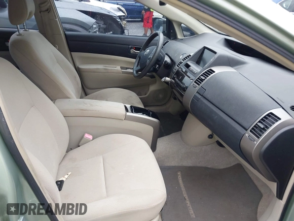 2007 Toyota Prius z VIN JTDKB20U077602951, wystawiony jako IAAI lot #42384098 z przebiegiem 169 136 mil mil oraz . Historia ofert i sprzedaży dostępna na DreamBid. Obrazek 5.