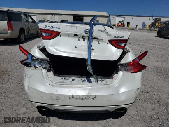 2018 Nissan Maxima Platinum z VIN 1N4AA6AP1JC401577, wystawiony jako Copart lot #49309685 z przebiegiem 33 403 mil mil oraz Czysty tytuł • Clean title. Historia ofert i sprzedaży dostępna na DreamBid. Obrazek 6.