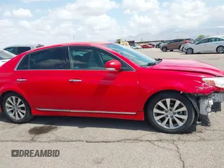2011 Toyota Avalon with VIN 4T1BK3DB3BU404093, listed as a IAAI auction lot 42163714 with 129,847 mi miles and . Bid and sale history available at carsss.com. Image 14.