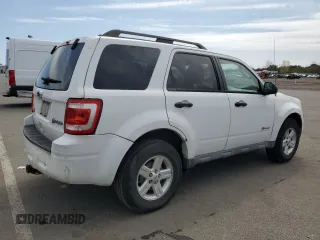 2010 Ford Escape Hybrid z VIN 1FMCU5K35AKC13081, wystawiony jako Copart lot #55447445 z przebiegiem 74 496 mil mil oraz Czysty tytuł • Clean title. Historia ofert i sprzedaży dostępna na DreamBid. Obrazek 3.